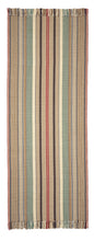 Ardmore #558-A is a bold vertical stripe design featuring tan, burgundy, green, blue and black. This rug is a focal point for any room, or a statement piece on stairs. Shown here in 27 inches x 6 feet with fringed ends.
