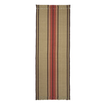 Adamstown is a classic center stripe design that comes in both runner and area rug sizes. It comes in two colorways. This is shown in an runner size of 27 inches wide and has one central stripe in red, brown, and gold on a khaki background with brown stripes on each edge.