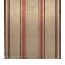 Adamstown is a classic center stripe design that comes in both runner and area rug sizes. It comes in two colorways. This is shown in an area rug size of 6 feet wide and has two central stripes in  red, brown, and gold on a khaki background with red, brown and gold stripes on each edge.