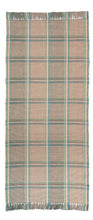 Amagansett #217-C is a versatile windowpane plaid of blue, green, cream, and rust stripes on a sandy background. With hints of blue, green and red and the neutral background, Amagansett coordinates with almost any color palette and is shown here in the 30 inch runner width.
